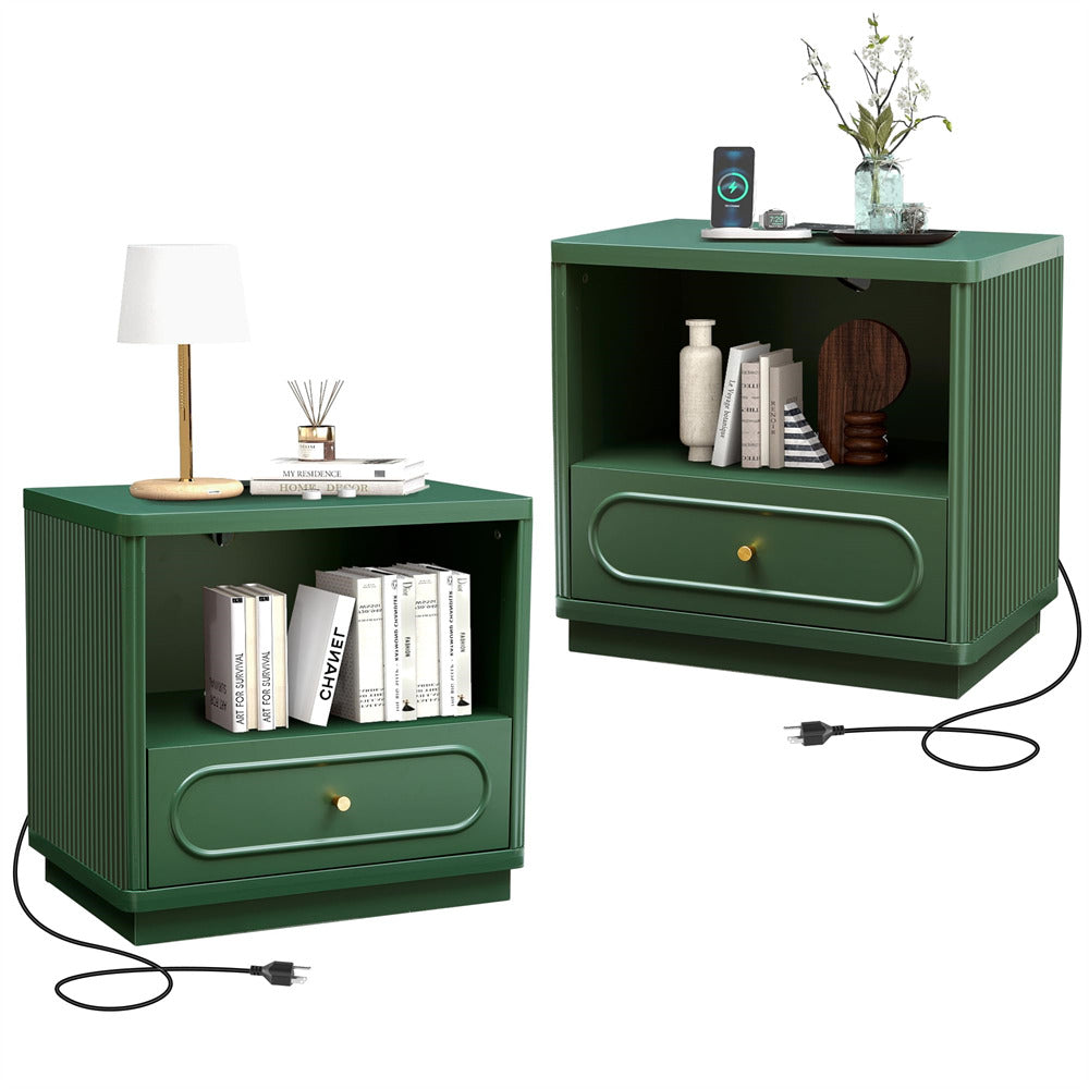Two green nightstands with books, a lamp, and decorative items on a white background