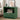 Green nightstand with decorative items in a bedroom setting