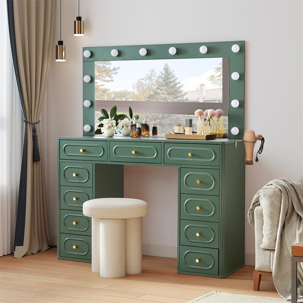 Green vanity desk with mirror and lights in a room setting
