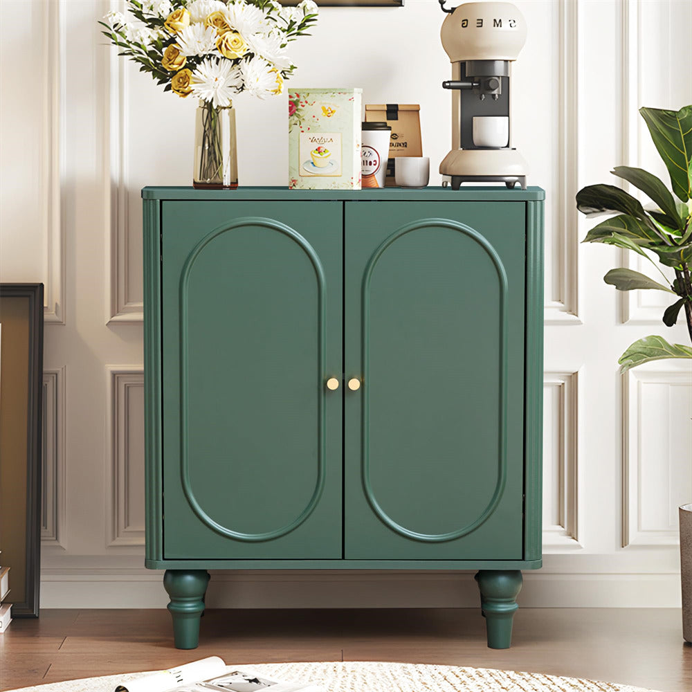 Green cabinet with decorative items on a wooden floor