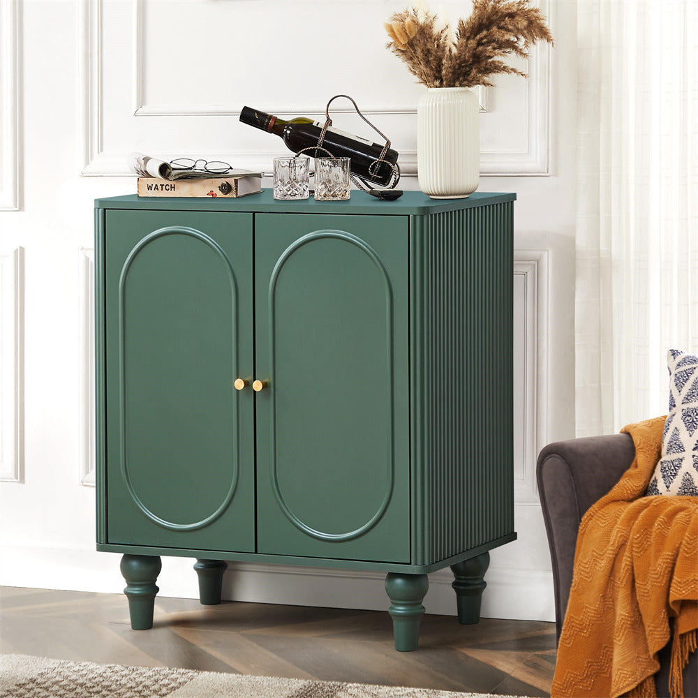 Green cabinet with decorative items in a room setting