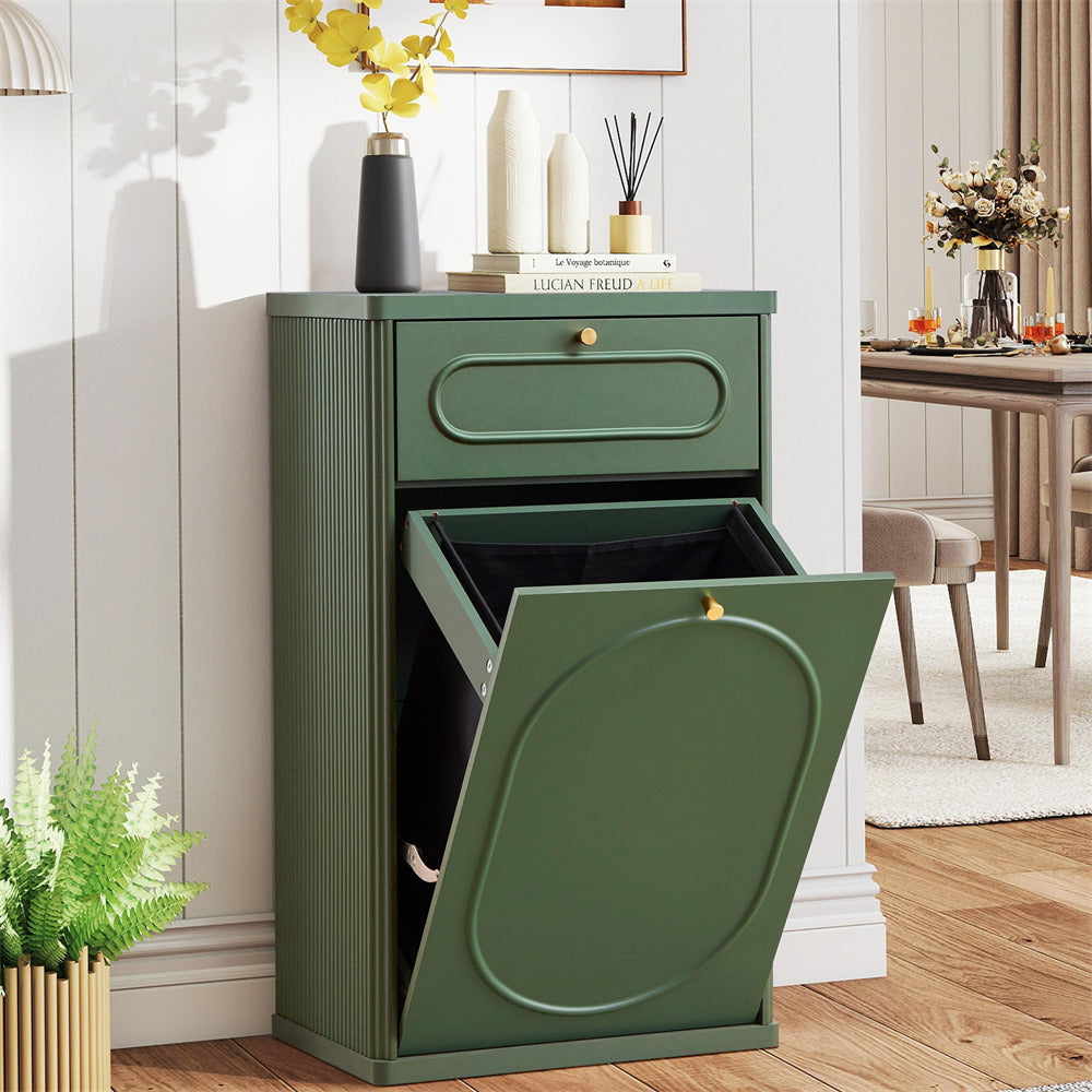 Green trash bin with open lid in a room with decor elements.