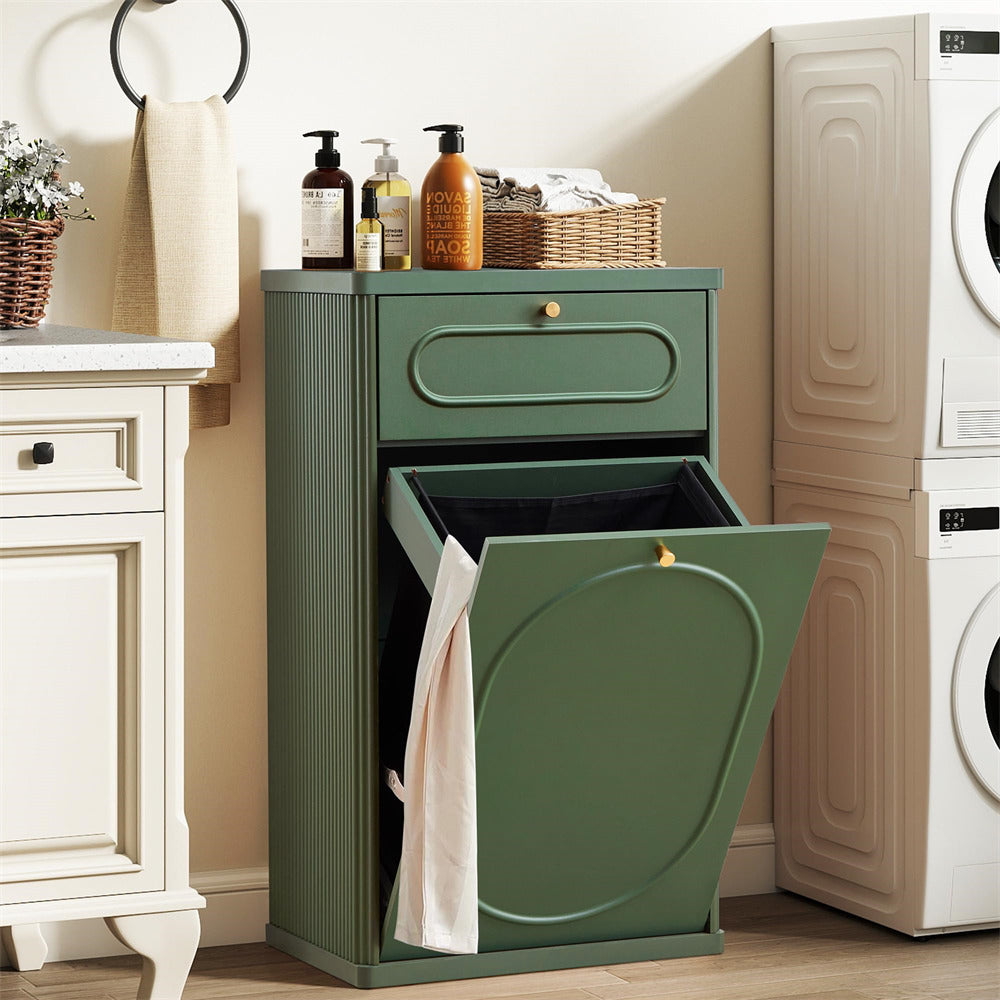 Green laundry basket with open lid in a laundry room setting.