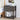 Decorative grey nightstand with books and a vase in a bedroom setting