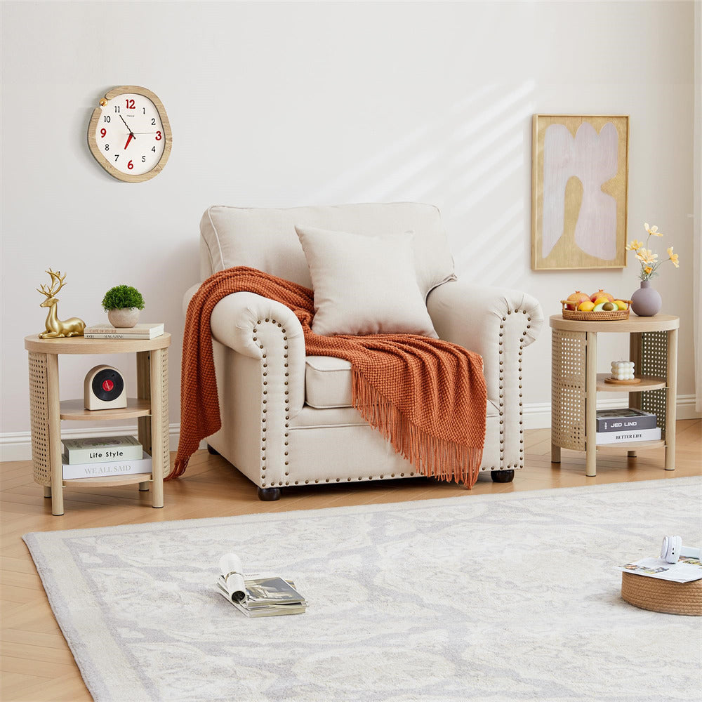 Cozy living room with a beige armchair, orange blanket, and decorative items.