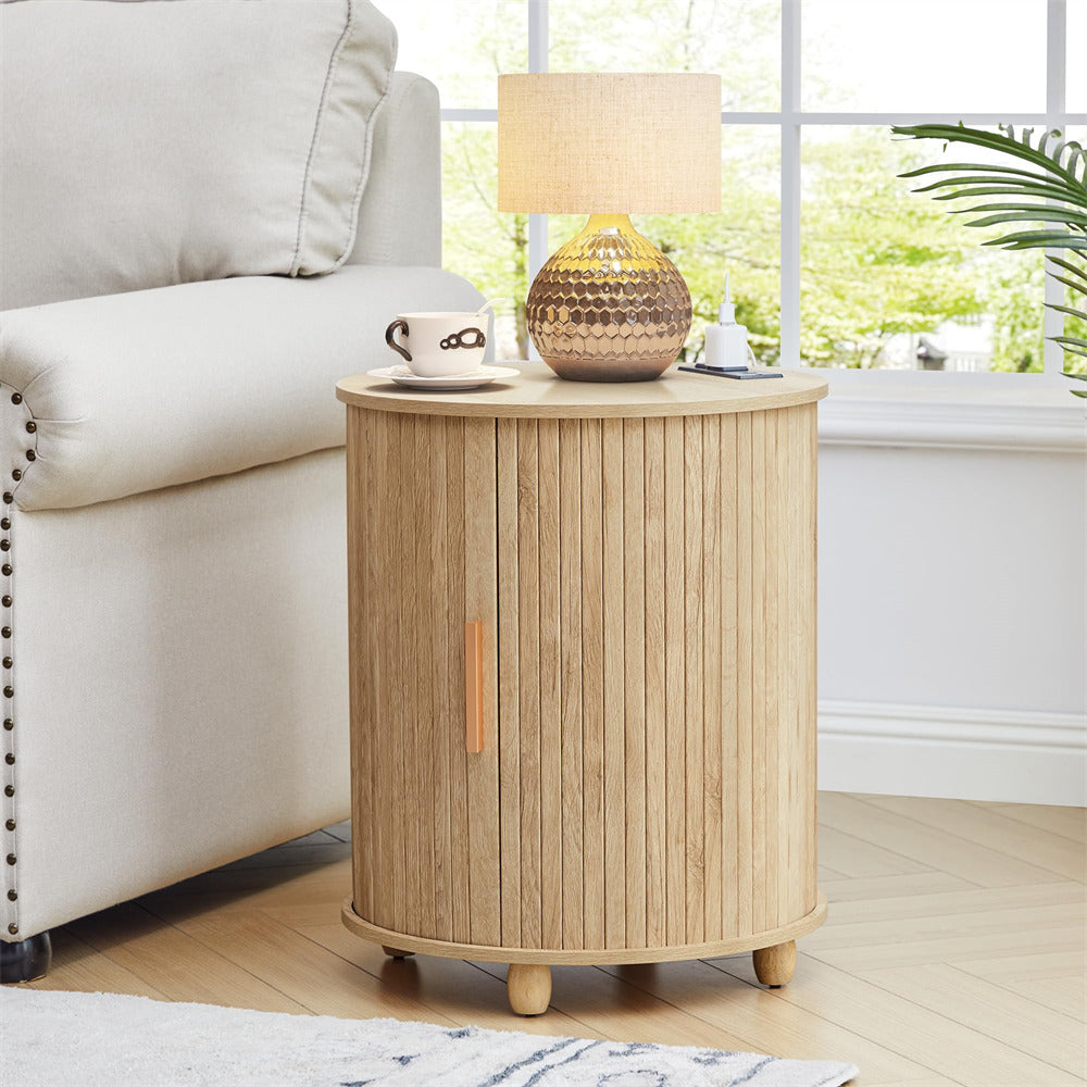 Wooden side table with lamp and cup in a living room setting