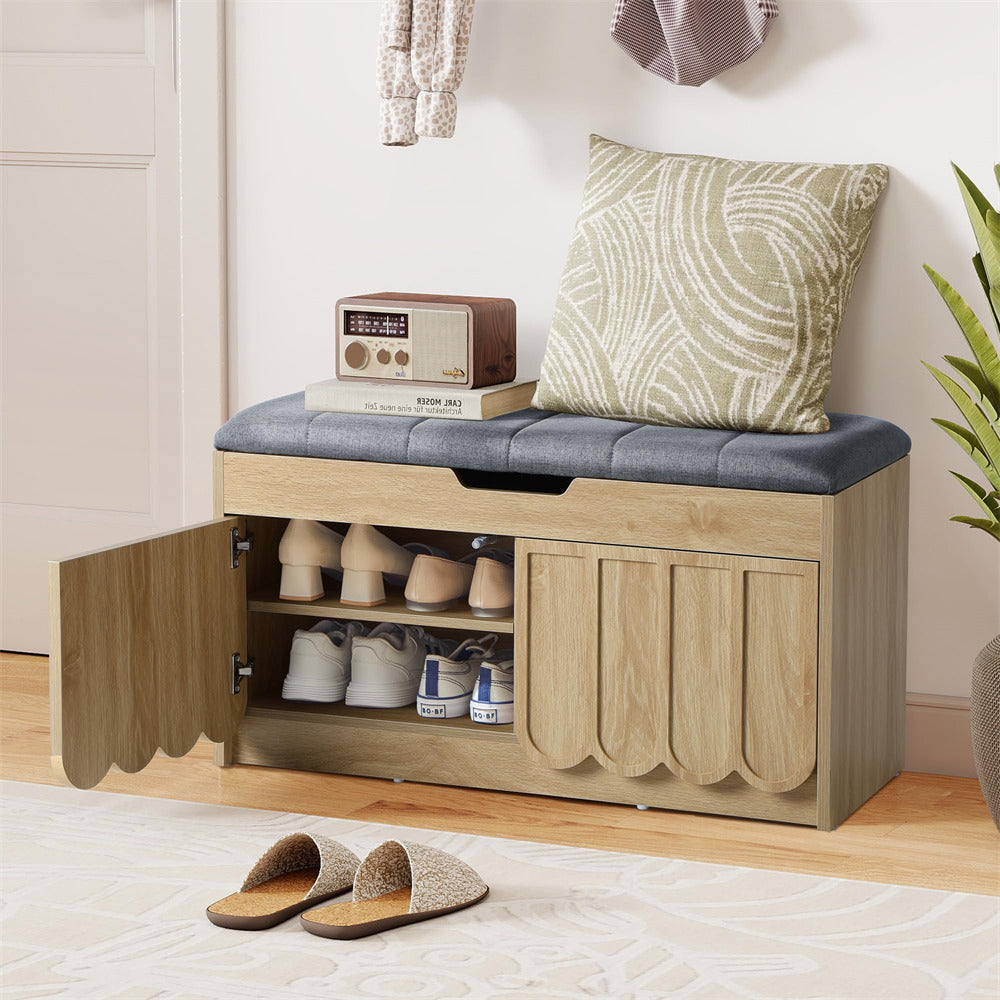 Wooden shoe storage bench with cushioned top and open doors revealing shoes, in a home setting.