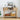Wooden console table with decorative items against a white wall