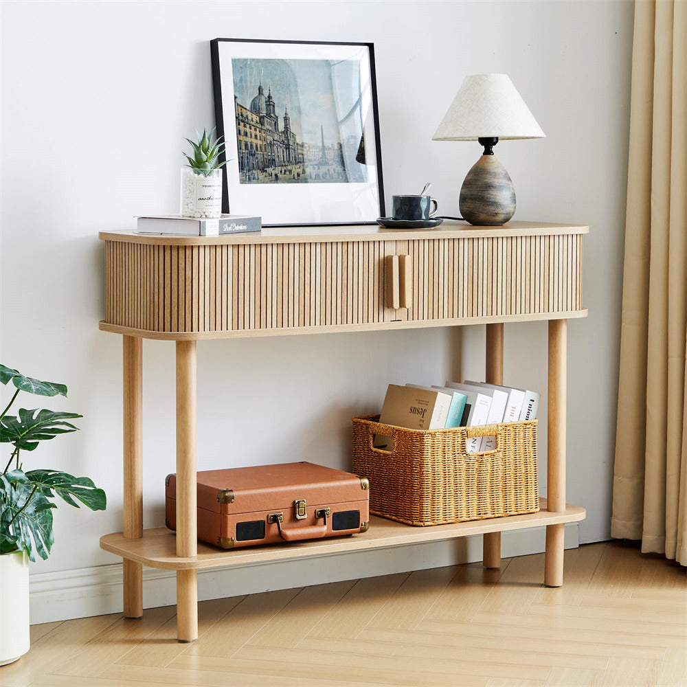 Wooden console table with decorative items in a room setting