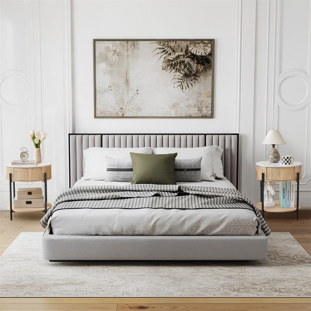 Modern bedroom with a bed, side tables, and decorative elements.