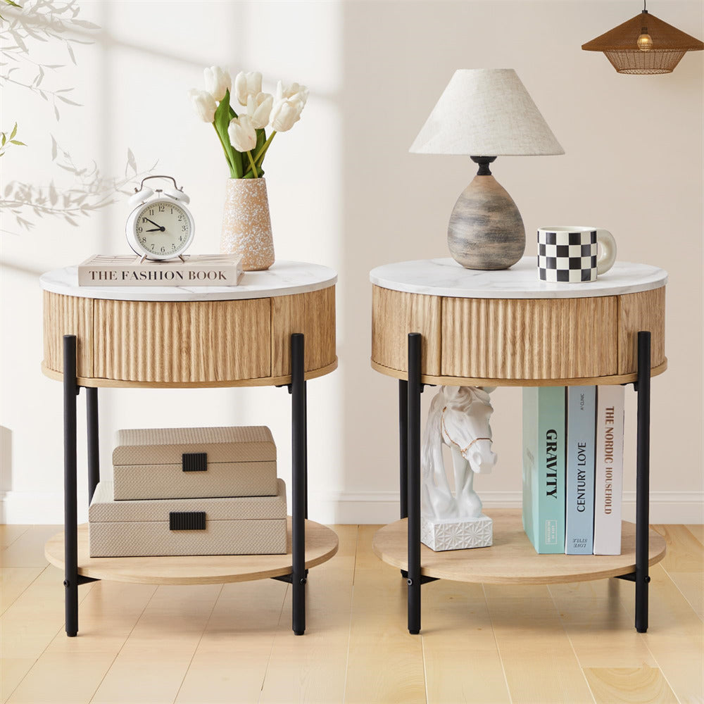 Two round side tables with decorative items in a room setting.