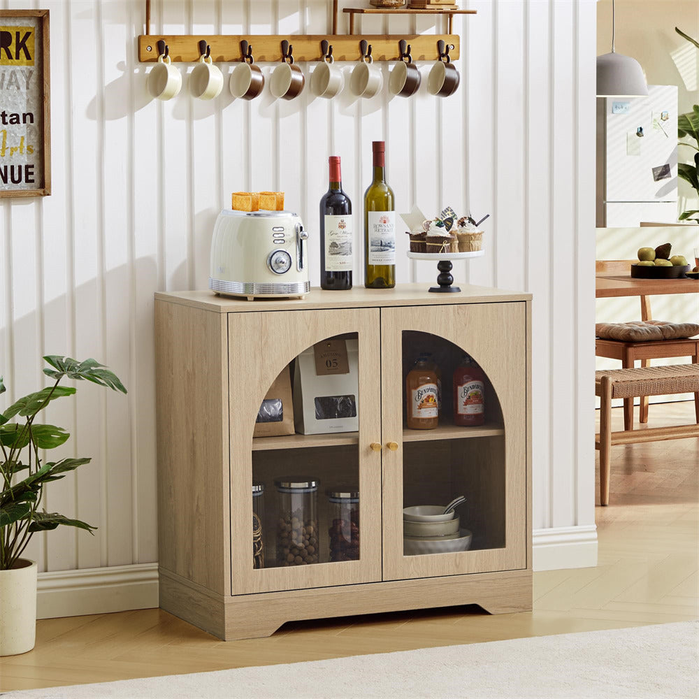 Wooden cabinet with glass doors displaying items in a room setting.