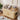 Wooden pet furniture with pet supplies and decor in a room setting.