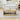 Wooden coffee table with decorative items in a living room setting