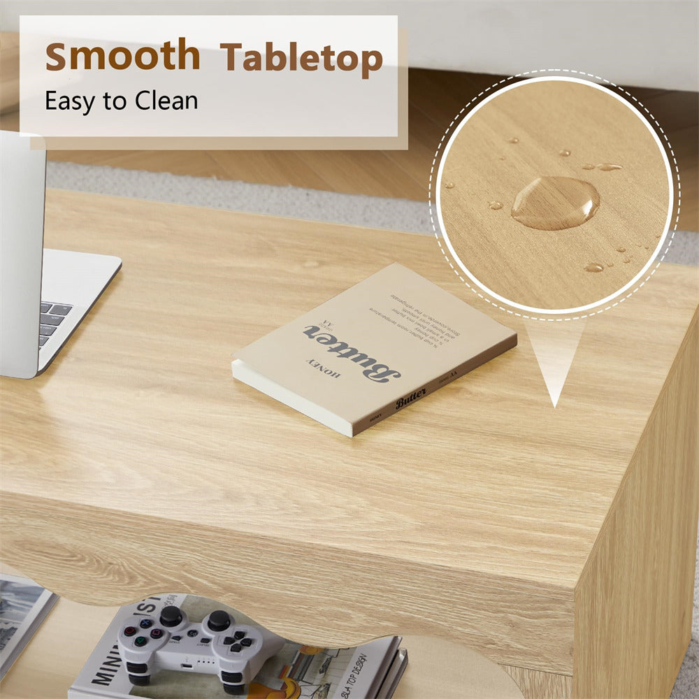 Wooden desk with a laptop, book, and remote control, highlighting the smooth tabletop.