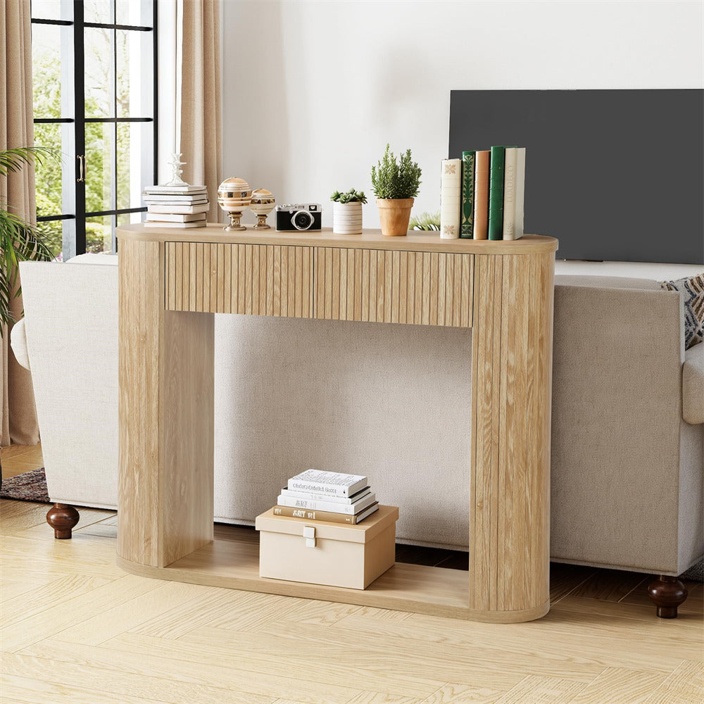 Wooden console table in a living room setting with decor items.