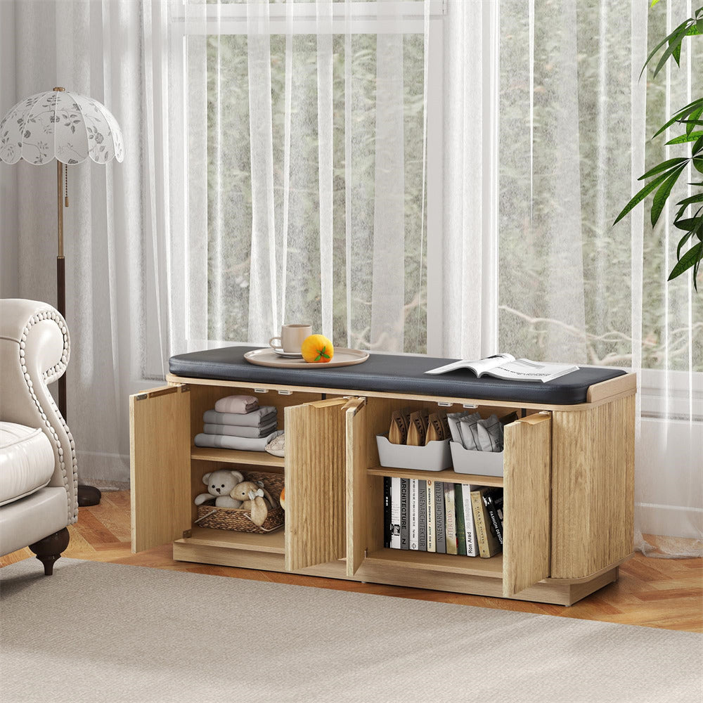 Wooden storage bench with cushion in a living room setting