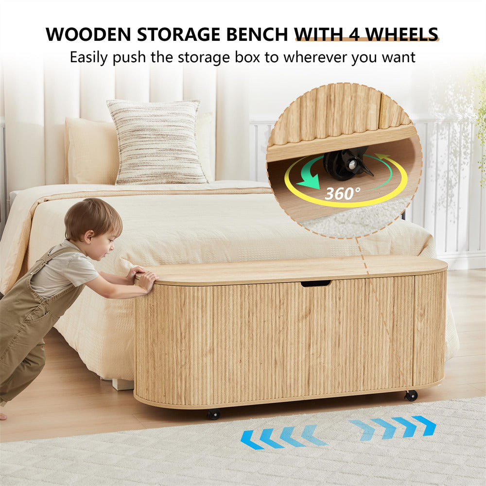 Wooden storage bench with wheels being pushed by a child in a bedroom setting.