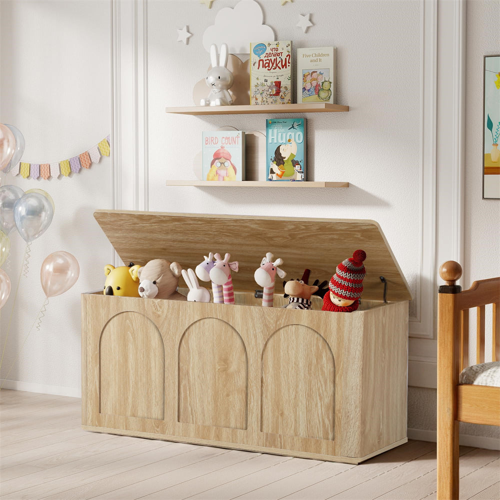 Wooden toy box with stuffed animals in a child's room with shelves and balloons.
