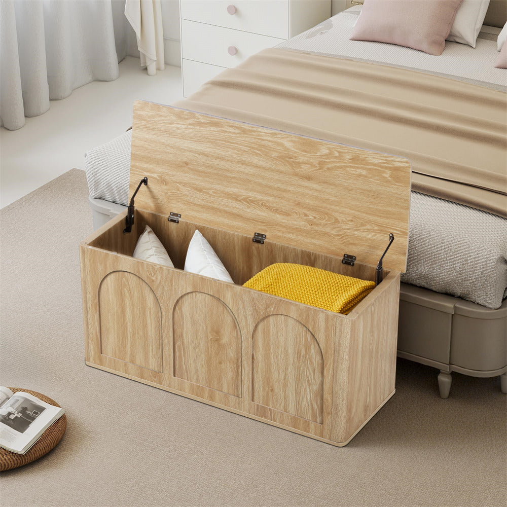 Wooden storage bench with cushions in a bedroom setting