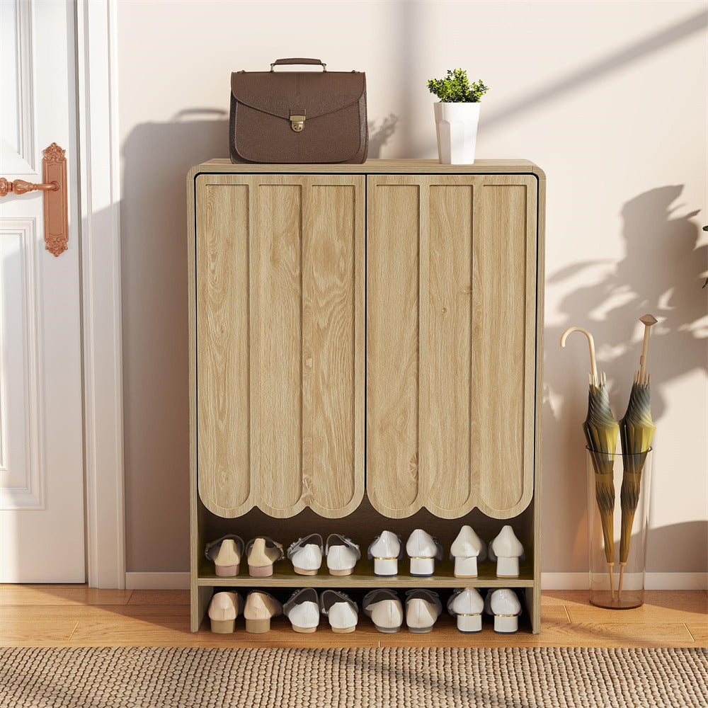Wooden 5-tier shoe cabinet with shoes on a wooden floor in a room.