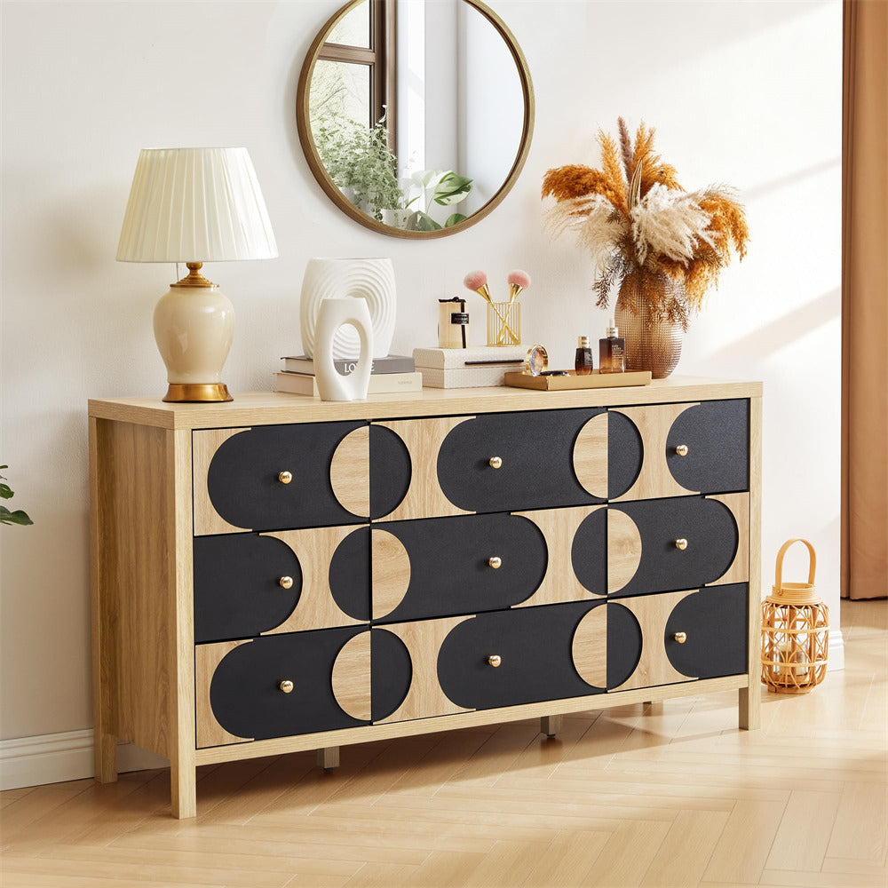 Wooden dresser with black geometric drawers in a room setting.