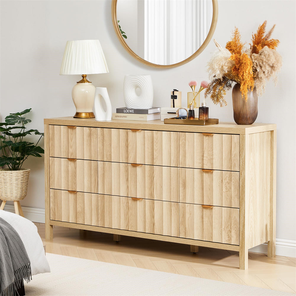 Wooden dresser with decorative items in a room setting