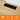Black 3-outlet power strip with a USB-C port mounted on a light wood desk surface, with an orange informational banner at the bottom detailing features like 2 outlets, Type-C, USB port, and feet cord length.