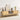 Wooden 59" TV stand with decorative items in a room with a light-colored wall and carpet.