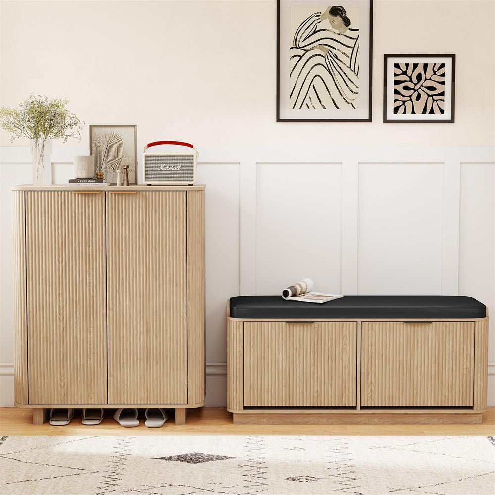Wooden 5 Tier shoe cabinet with black cushioned bench against a white wall with decorative frames.