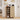Wooden 5 Tier shoe cabinet with shoes inside in a room setting
