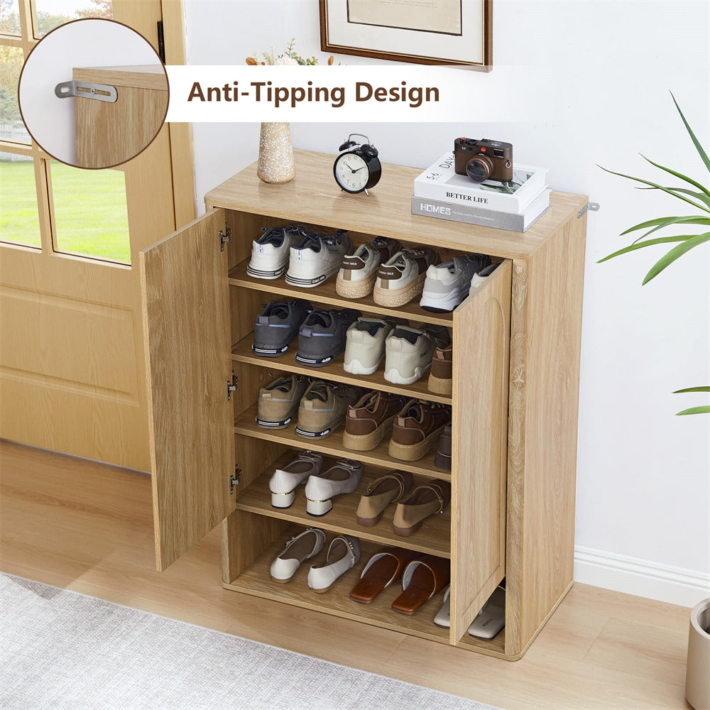 Wooden shoe cabinet with anti-tipping design feature, filled with shoes in a room setting.