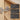 Cabinet door hinge with adjustment instructions on a wooden background