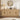 Beige sideboard with decorative items in a room setting