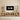 Wooden entertainment console with digital clock display in a living room setting