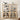Wooden bookshelf with decorative items in a room setting