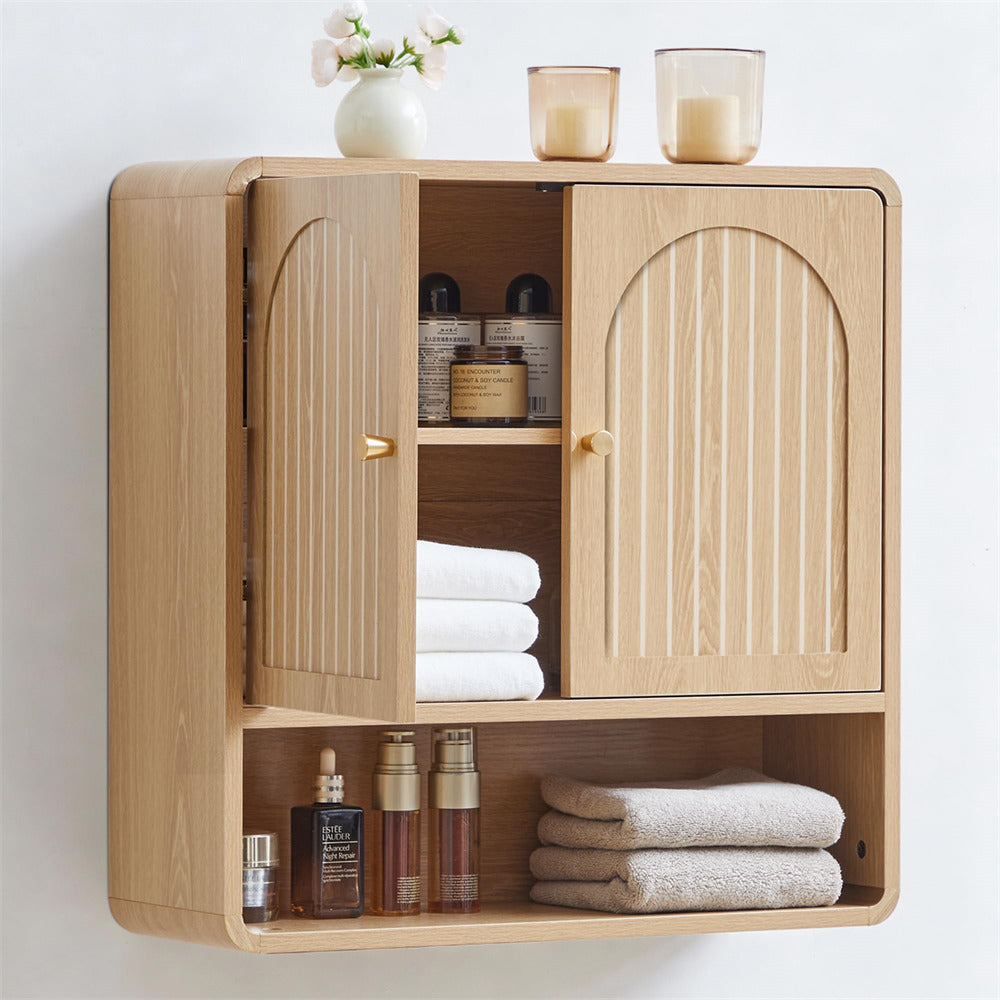 Wooden cabinet with open doors displaying towels and skincare products on a white background
