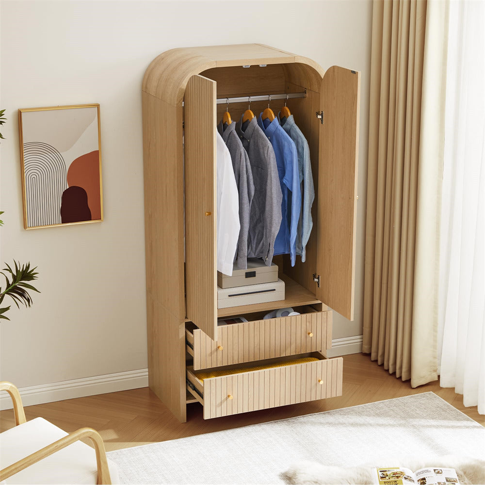 Wooden wardrobe with open doors displaying clothes in a bedroom setting.