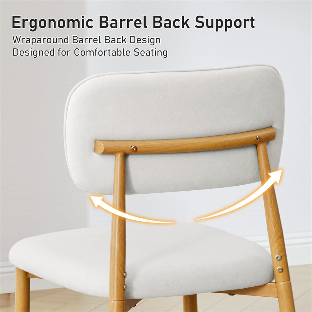 A light upholstered dining chair with a natural wood frame, shown from the back to highlight the wraparound barrel back design. Text at the top reads 'Ergonomic Barrel Back Support' with arrows indicating the curved support shape.