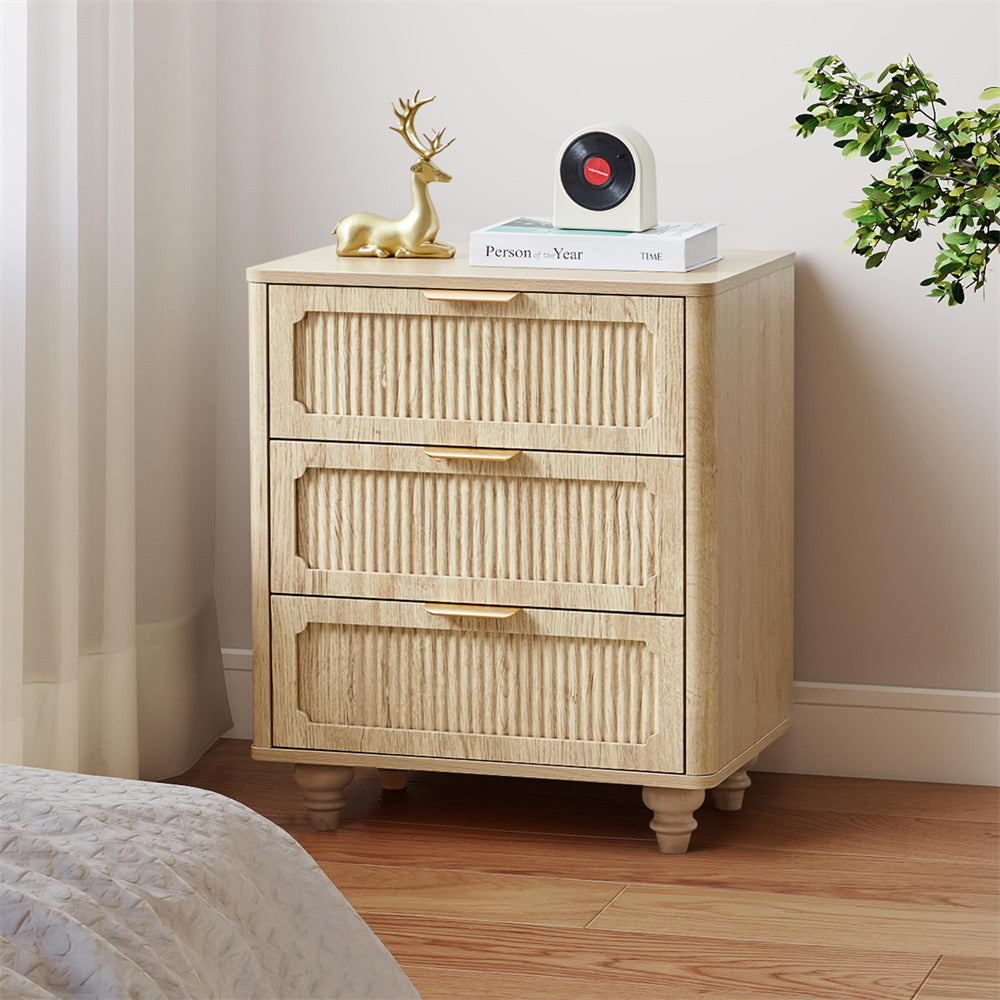 Wooden nightstand with decorative items against a neutral wall