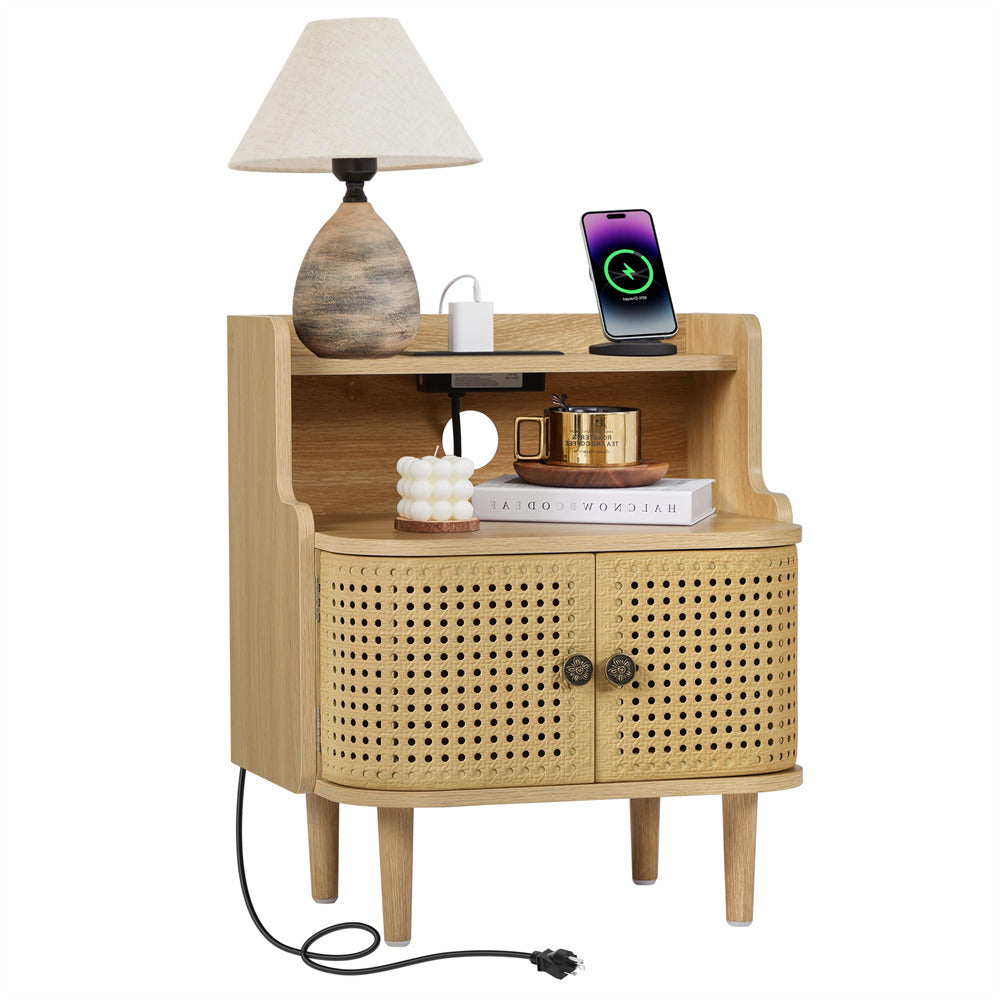 Wooden side table with lamp, phone, and other items on a white background