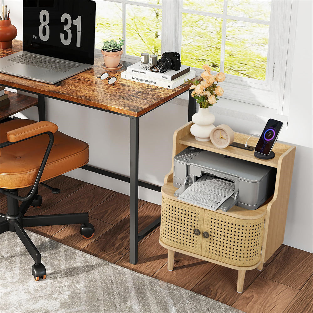 Home office setup with a desk, chair, printer, and decor items.