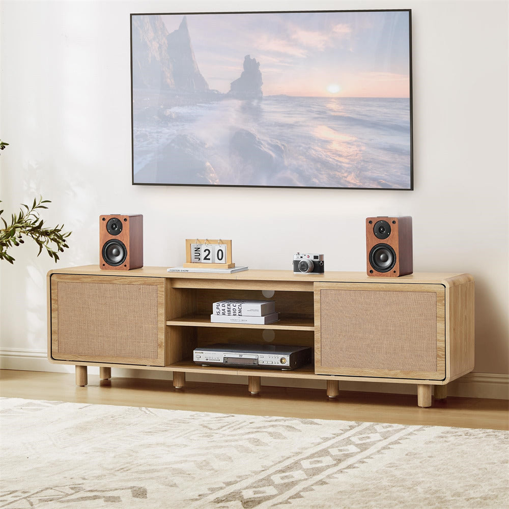 Wooden entertainment console with speakers and a TV above in a room setting.