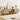Wooden entertainment console with decorative items in a living room setting
