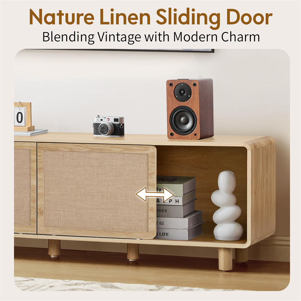 Wooden entertainment console with sliding door, camera, speaker, and books on a white background.