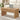 Wooden coffee table with a laptop and cup in a living room setting