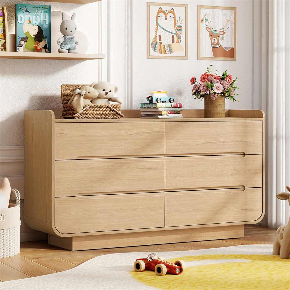 Wooden 6-drawer dresser in a child's room with toys and decor