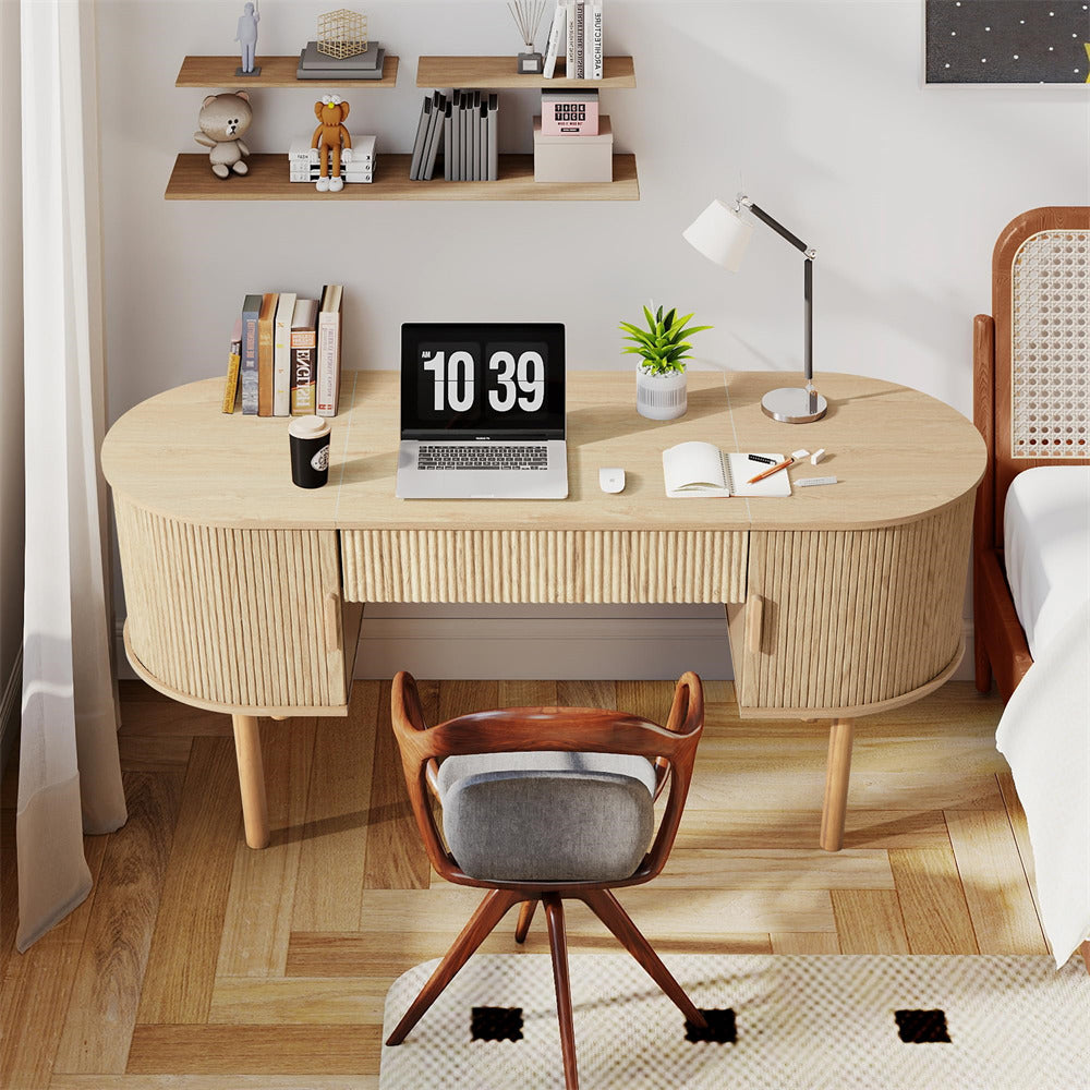 Wooden desk with laptop, books, and decor in a room setting