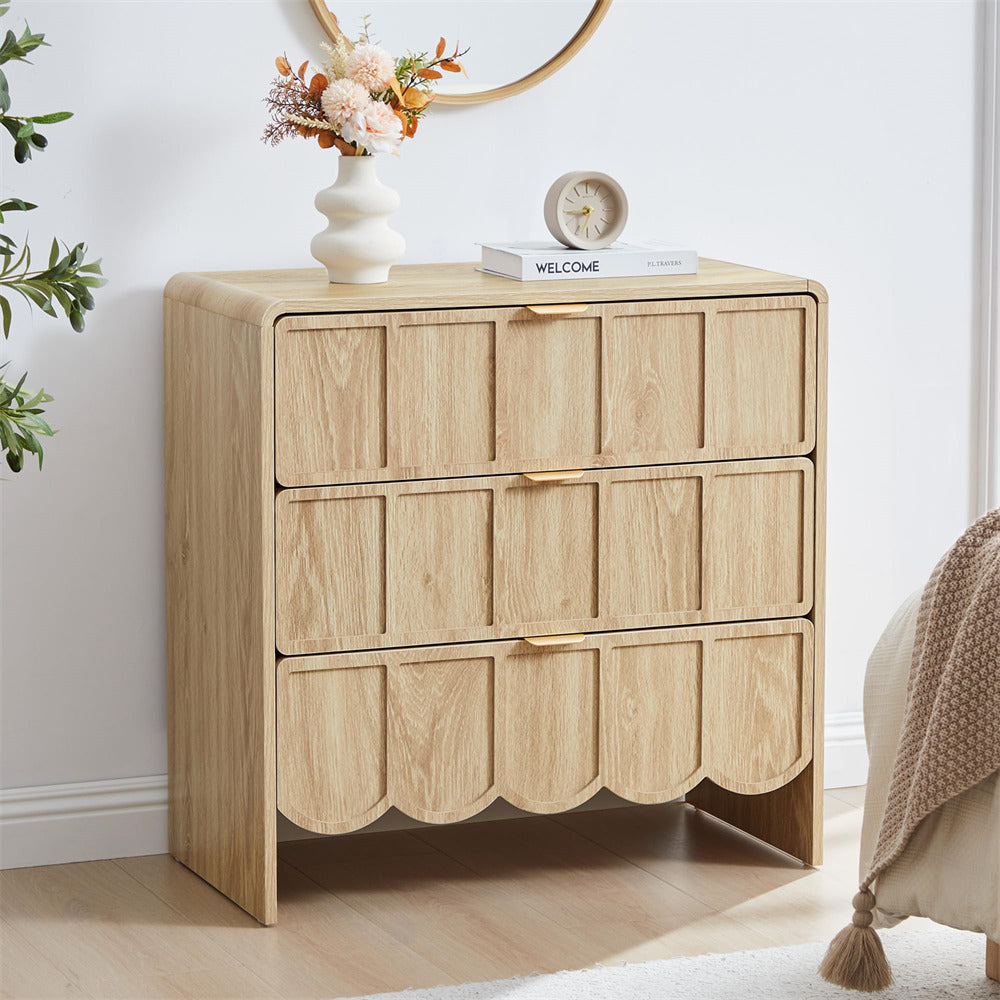 Wooden dresser with decorative items in a room setting