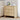 Wooden side table with decorative items in a living room setting